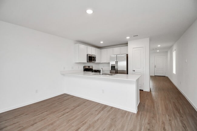 Building Photo - 1611 Windrose Bnd