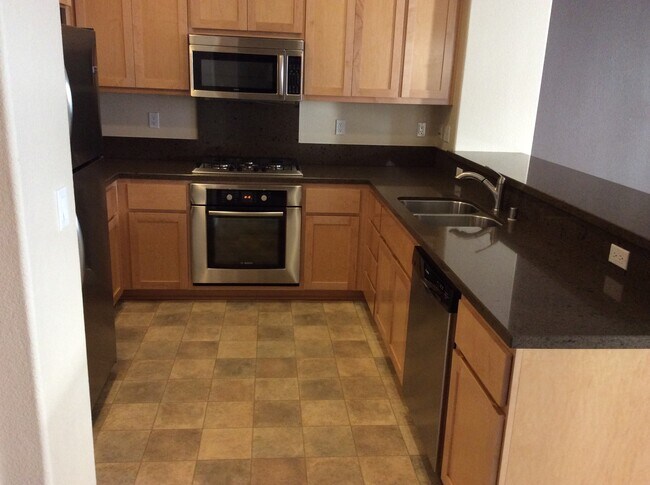 Building Photo - Opportunity Knocks! Updated Tri-Level prop...