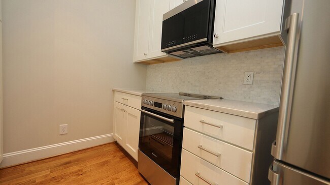 Building Photo - Luxury Condo in the Village District of Downtown Raleigh - Walking Distance to Shopping + Dining