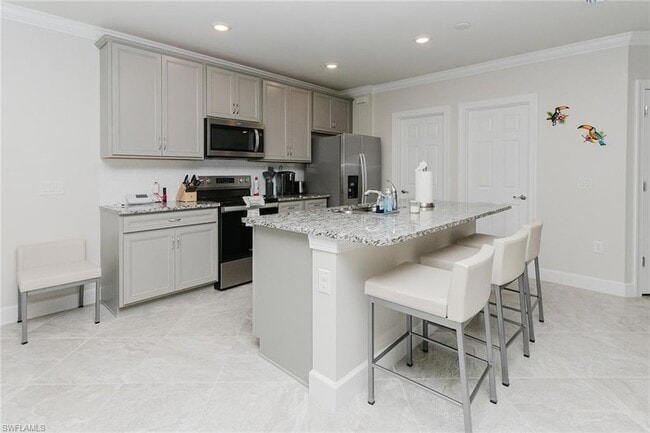 Building Photo - 6189 Harmony Dr