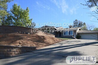 Building Photo - 4 Bedroom 2 Bathroom with Garage and Green...