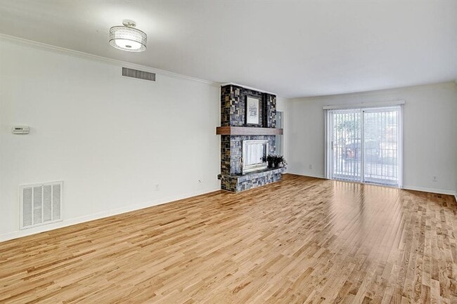 Building Photo - Beautifully remodeled two-story condo in a...