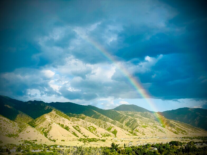 You will often see a grand full moon just above these mountains & rainbows from the property - 483 Boulevard