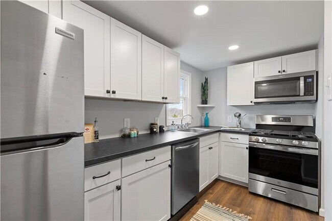 Building Photo - Spacious 4-Bedroom Home with Modern Updates & Private Driveway