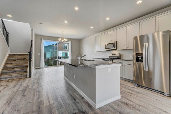 Building Photo - Modern 4BR with Open Kitchen, Patio & 2-Car Garage