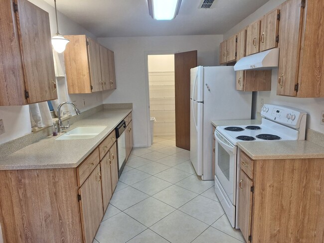 Building Photo - PELICAN COVE WEST 2BR 2BA WITH GARAGE FOR RENT