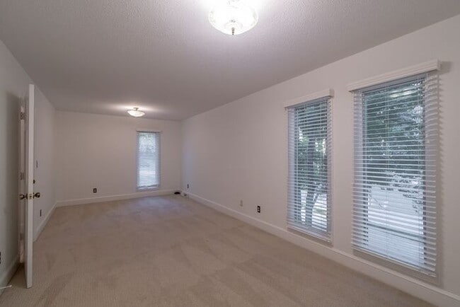 Building Photo - Spacious 4-Bedroom Mint Hill Retreat with Fireplace, 2-Car Garage & 3,600+ Sq Ft
