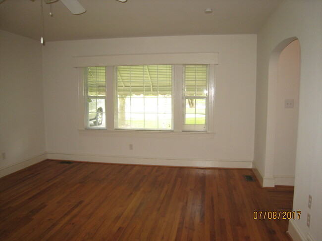 Family room. - 1911 E 4th St