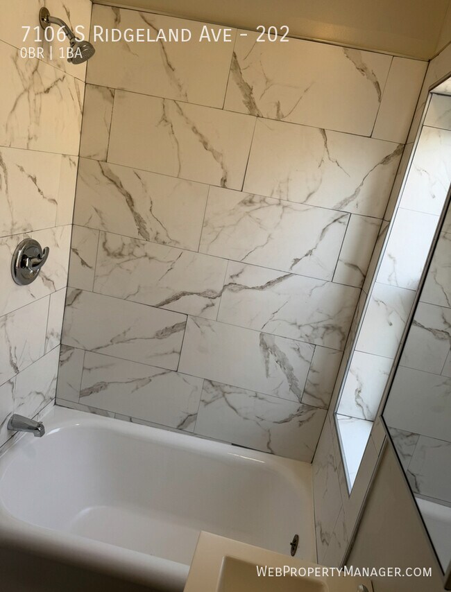 Building Photo - 7106 S Ridgeland Ave