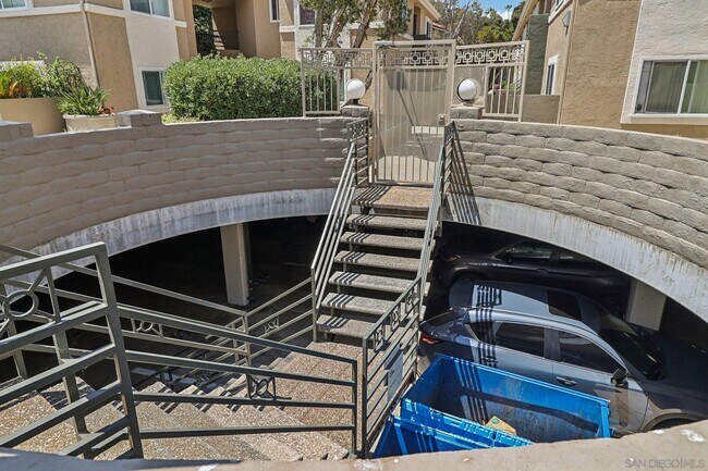 Building Photo - 7565 Charmant Dr