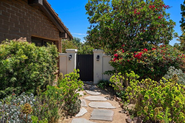 Building Photo - This Beautiful Hacienda Style Home combine...