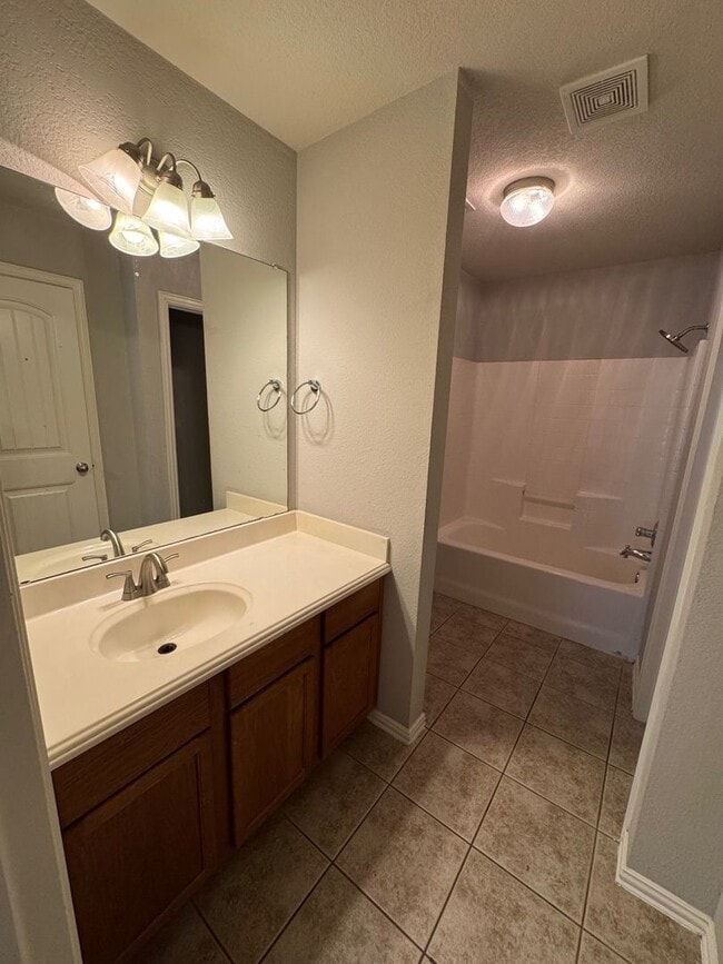 Building Photo - Updated Midway ISD Duplex