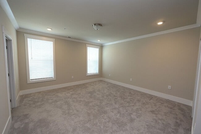 Building Photo - Modern Condo in Brier Creek Cottages Community w/ Oversized Garage!