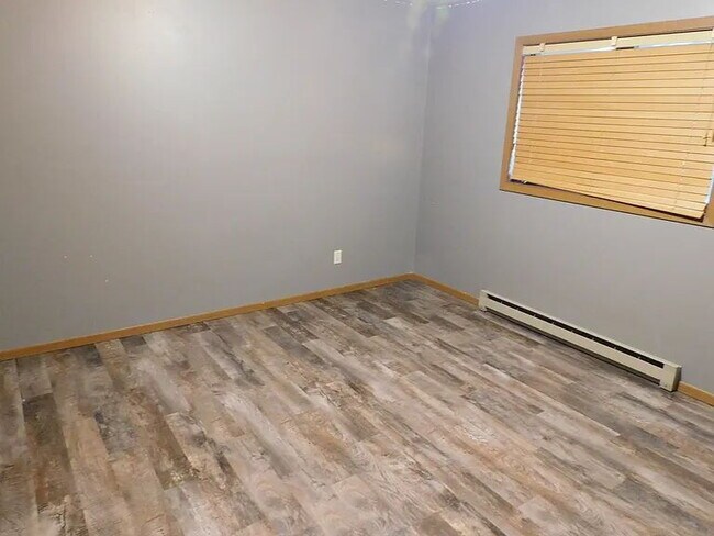 Building Photo - "Charming 2-Bed Retreat: Your Cozy Getaway...