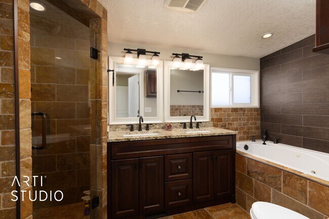 Building Photo - **Stunning 4-Bedroom Home with Modern Amen...