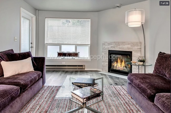 Building Photo - Spacious, Modern Northgate Condo w/ Quartz Kitchen, Secure Parking, Pool & Light Rail Access