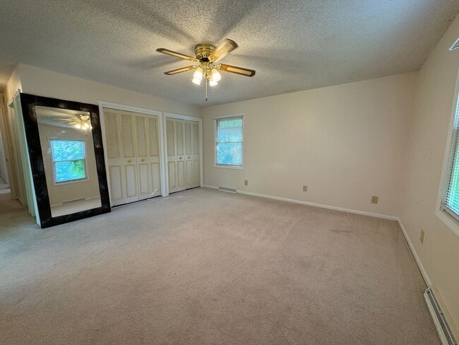 Building Photo - Beautiful Duplex Located in Serene, Wooded...
