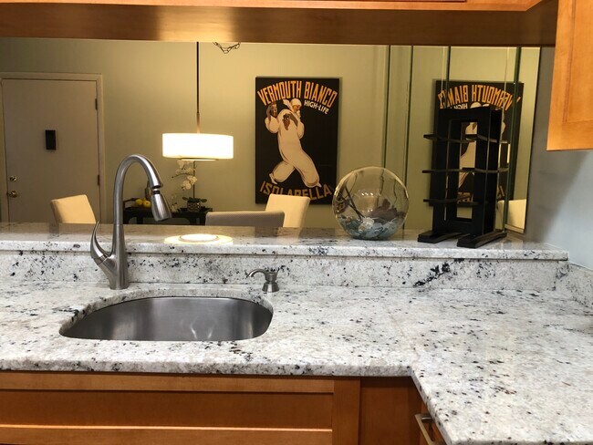 VIEW FROM KITCHEN TO DINING AREA - 630 Bird Bay Dr E