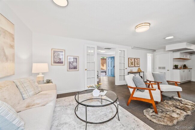 Building Photo - "Spacious 5-Bedroom Gem with Hardwood Floors & Cozy Fireplace in Denver's Heart!"