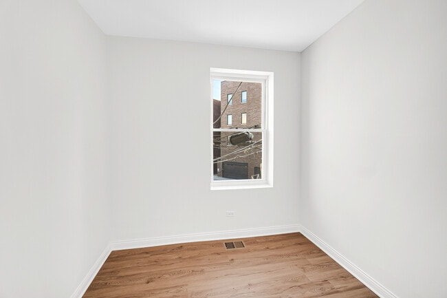 Building Photo - 1225 N Milwaukee Ave