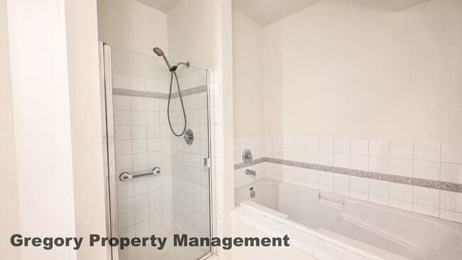 Building Photo - Sunlit & Spacious Ground-Level Condo | 12-Foot Ceilings, Luxury Amenities & Ideal Locale