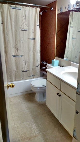 Bathroom with Marble Floor - 11305 Commonwealth Dr