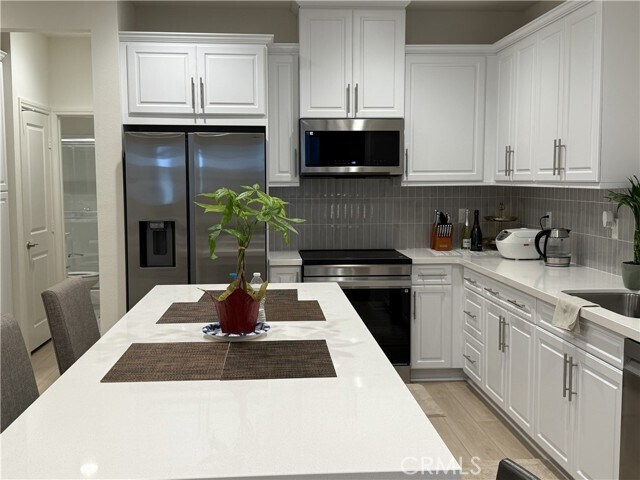 Building Photo - 243 S Sand Palm Dr