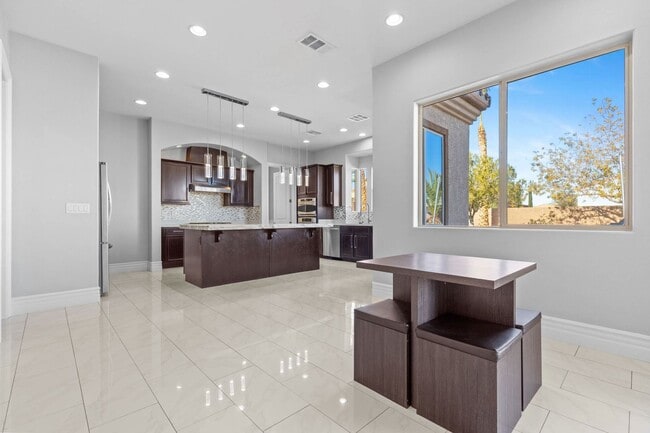 Building Photo - Canyon Falls Single-Story: Chef’s Kitchen, Office + Built-In BBQ Yard (3-Car)