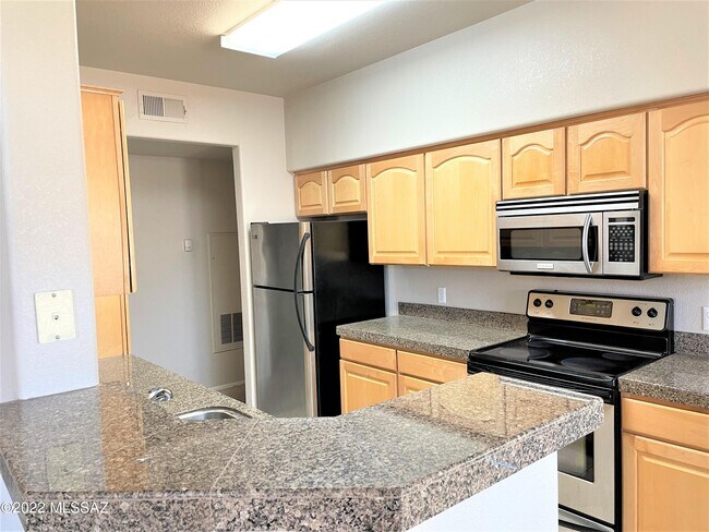 Building Photo - 7050 E Sunrise Dr