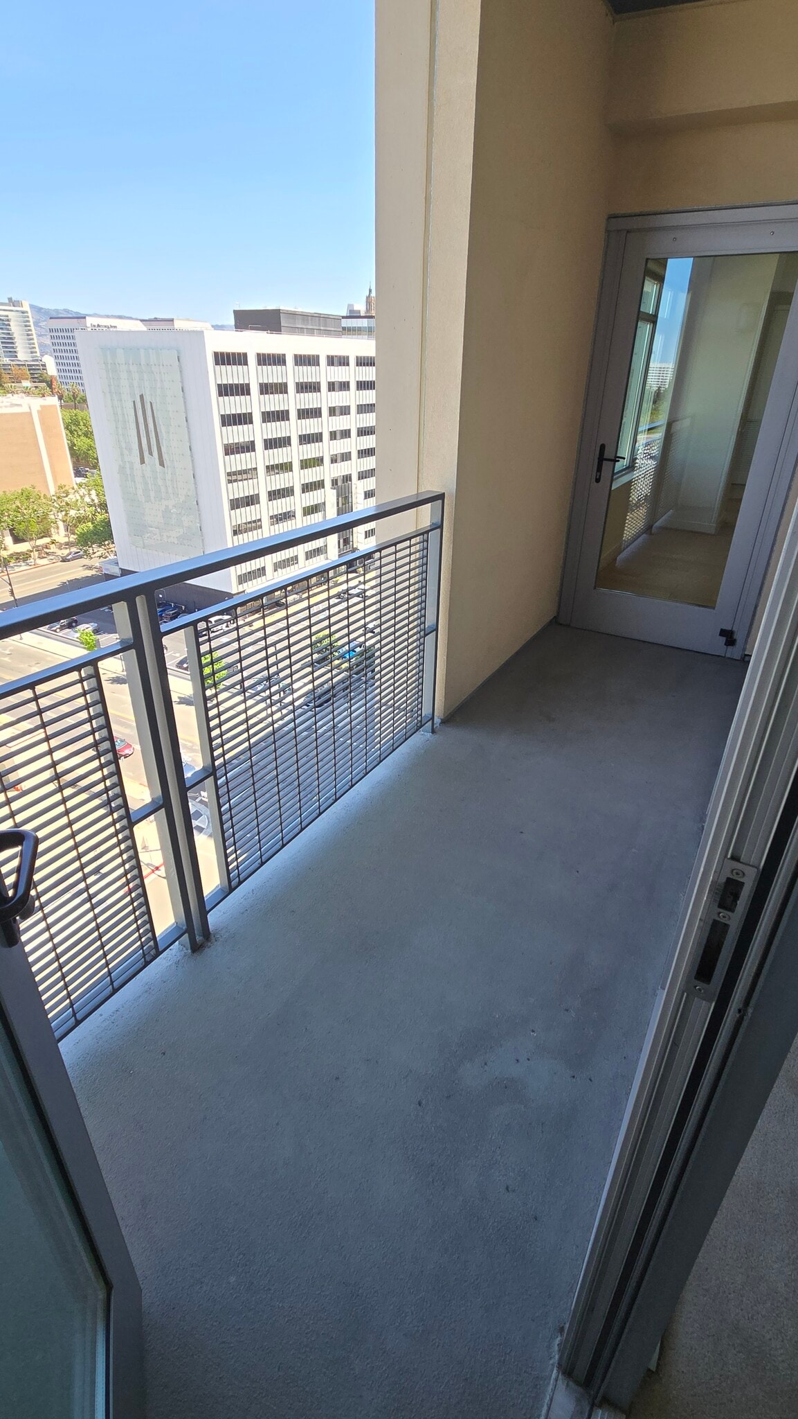 Large balcony accessed from living room and guest bedroom - 175 W Saint James St