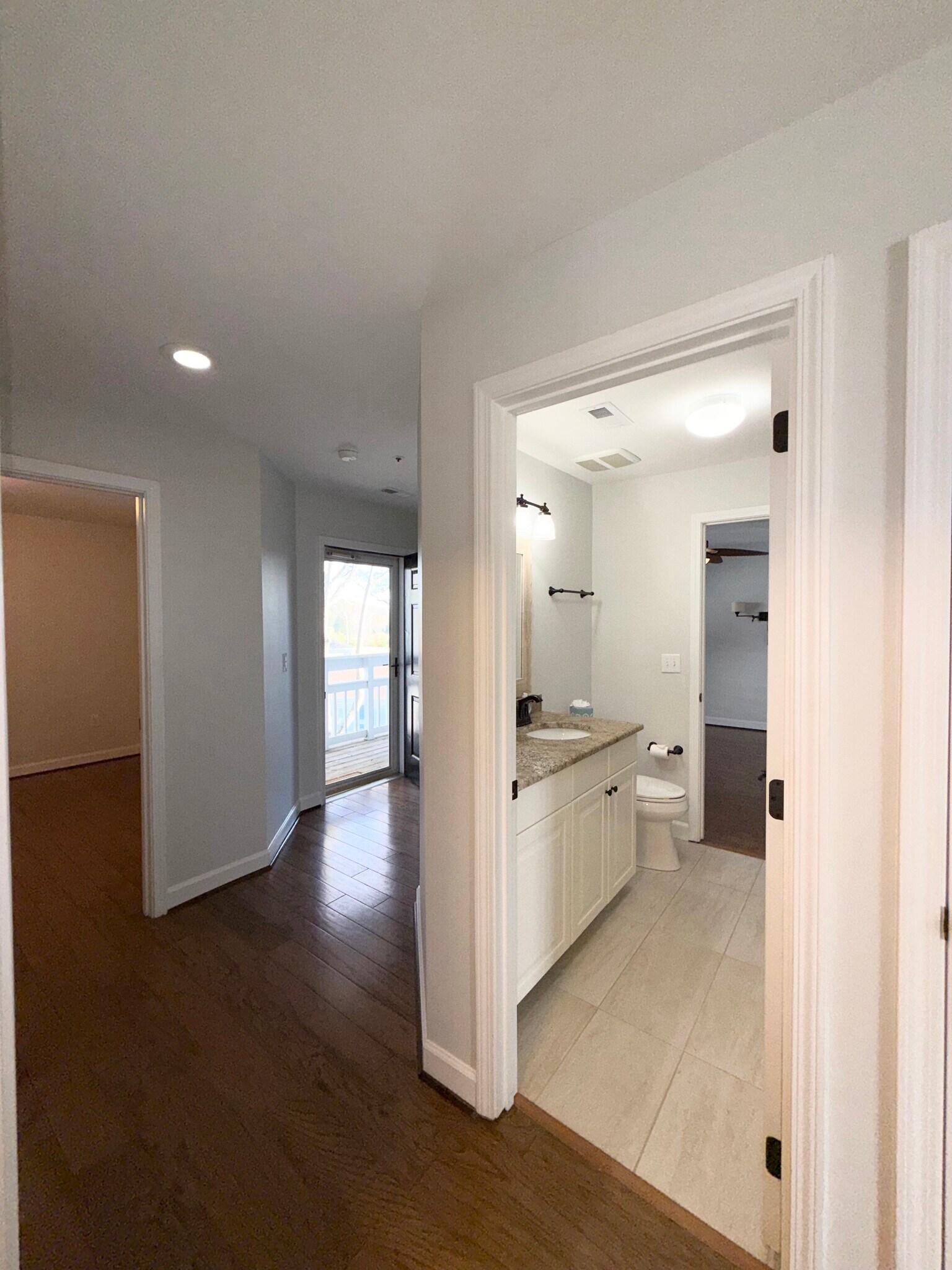 Hall near guest bedroom and 2nd and 3rd bedrooms - 1133 Torrence Cir