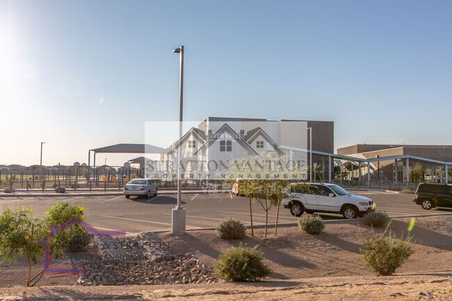 Building Photo - 9638 E Tesla Ave