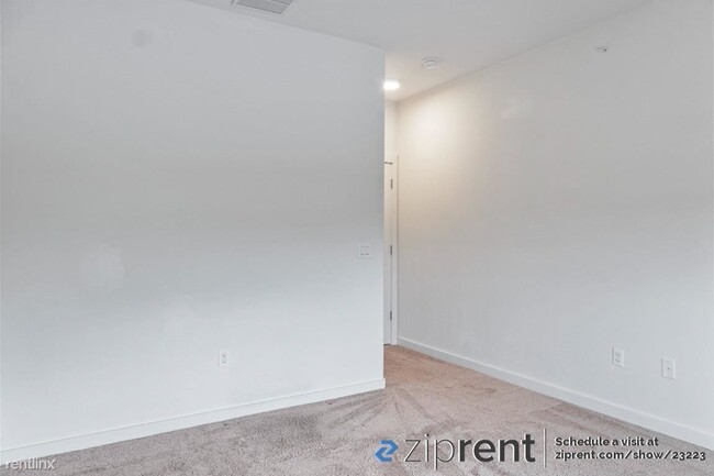 Building Photo - 2 br, 2.5 bath Townhome - 7805 Cooper Lane...