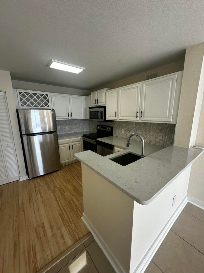 Building Photo - 1745 Palm Cove Blvd