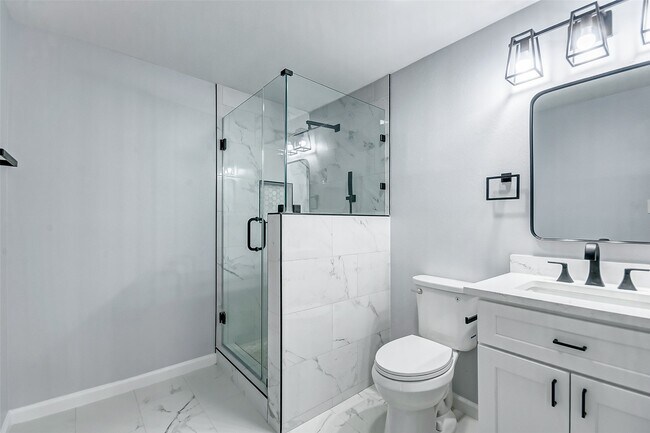 Building Photo - 5122 W Bellfort Ave