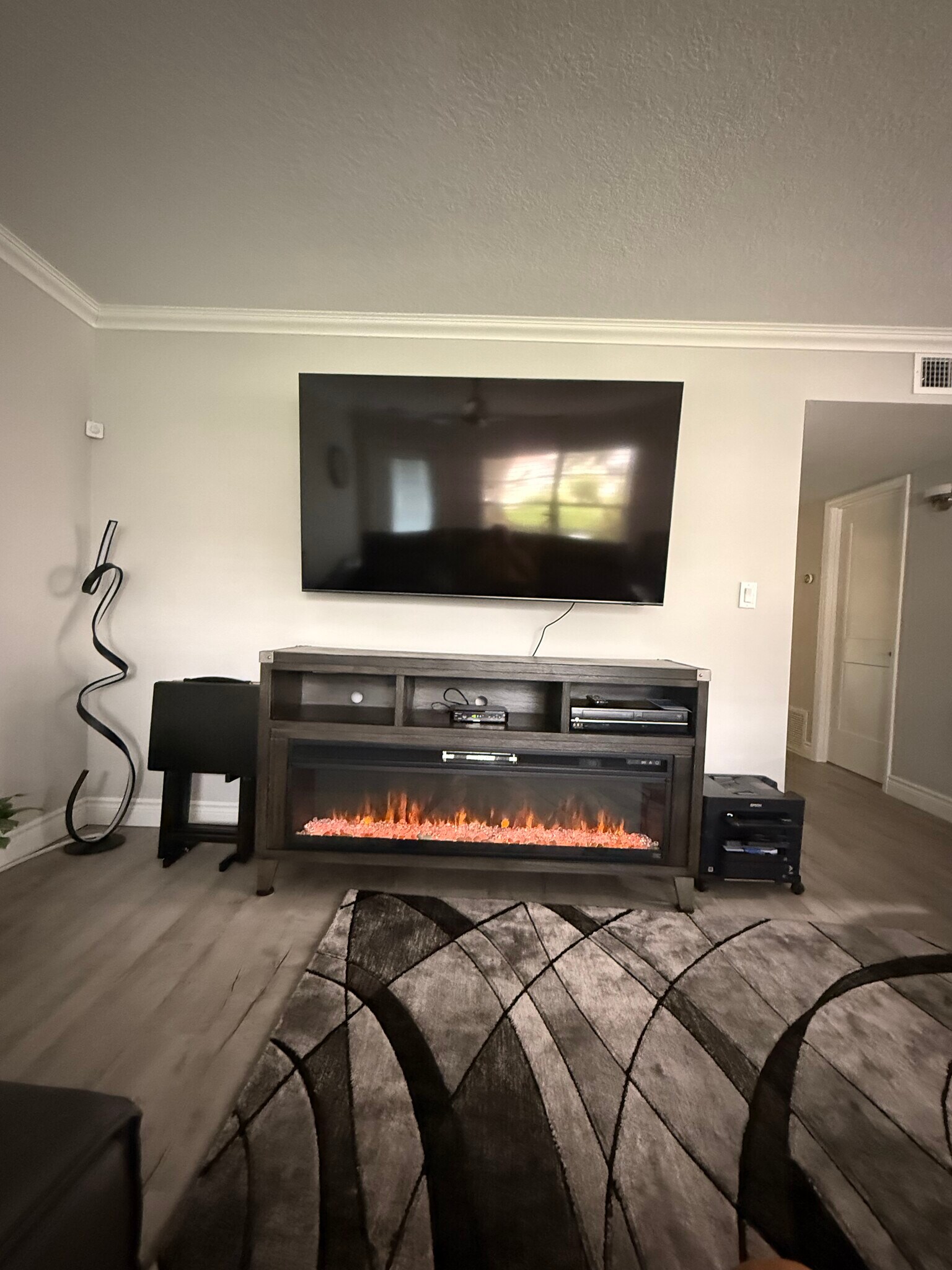 Entertainment center with electric fireplace - 10 Vista Palm Ln