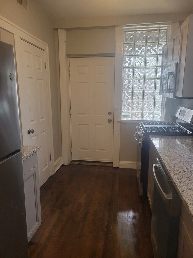 Building Photo - 7918 S Essex Ave