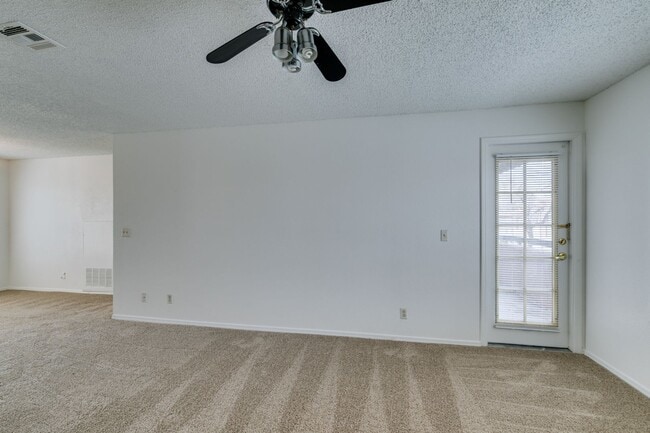 Building Photo - Charming Second-Floor Condo with Two Bedrooms and Fireplace