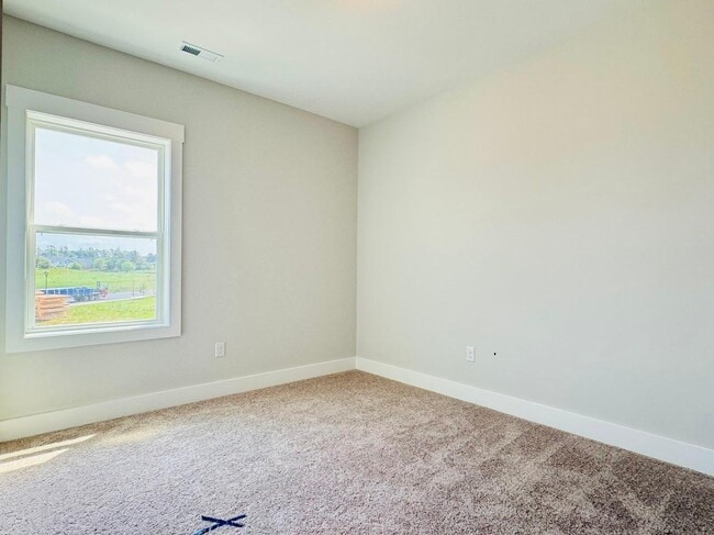 Building Photo - 4 bedroom End Unit Townhome in Wendell Fall