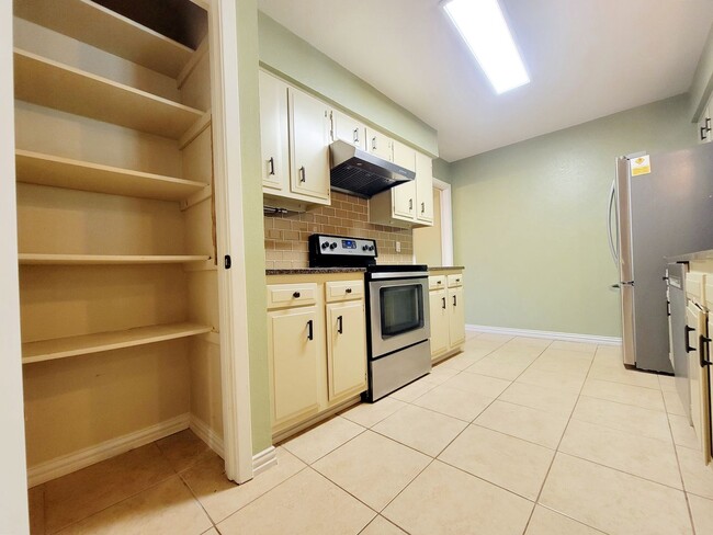 Building Photo - 3 Bed, 2 Bath Single-Level Gem with Firepl...