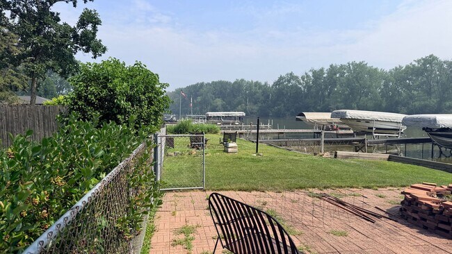 Building Photo - Riverfront Living on the Fox: 2 Bed, 1 Bath with Private Dock and Oversized Garage