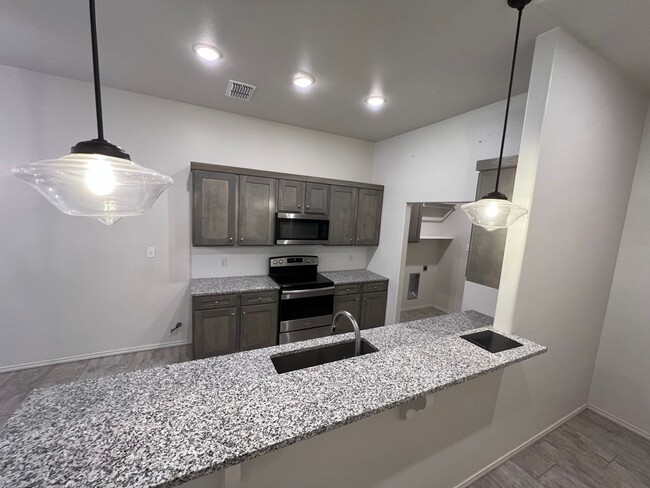 Building Photo - New 2 Bedroom Townhome Available In Wolffo...