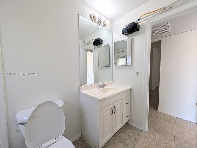 Building Photo - 11394 Royal Palm Blvd