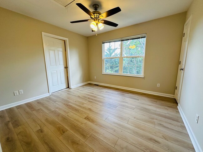 Building Photo - 2 bed, 2.5 bath updated townhouse w/ 1-car garage & Trex deck available now