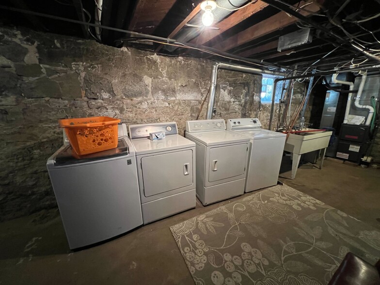 Laundry in basement - 304 Cedar Lake Road South #1