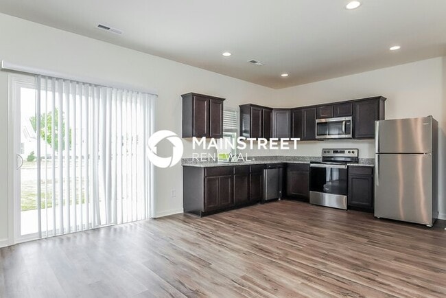Building Photo - 4 Bedroom Pet-Friendly Home in Zebulon, NC with Main Street Renewal