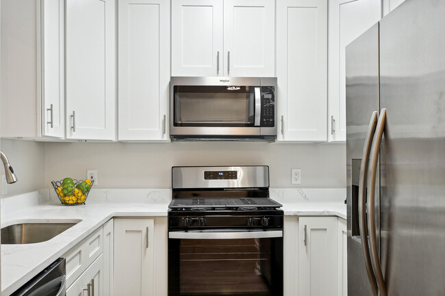 Kitchen with new white cabinets - 1712 Lake Shore Crest Dr