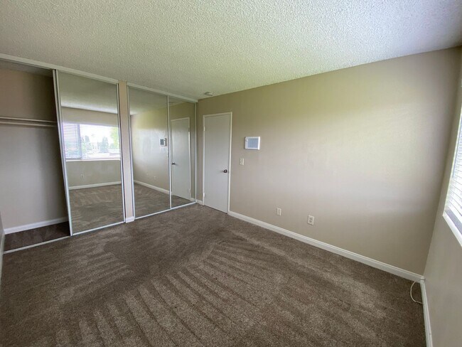 Building Photo - LOCATION & PRIVACY! Spacious 3 br Condo wi...