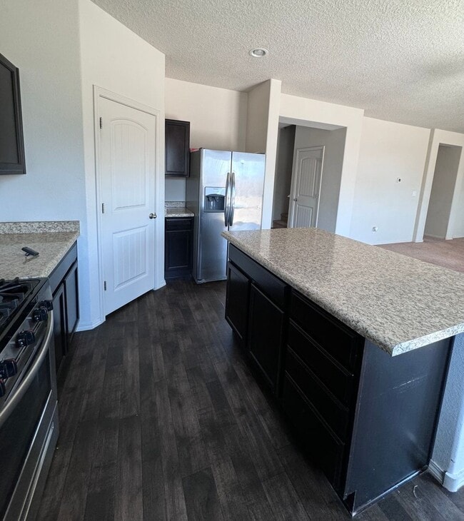 Building Photo - 4 bed home available now!