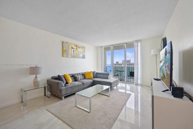 Building Photo - 19370 Collins Ave
